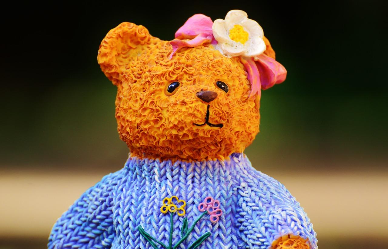 Knitted sweater on a teddy bear