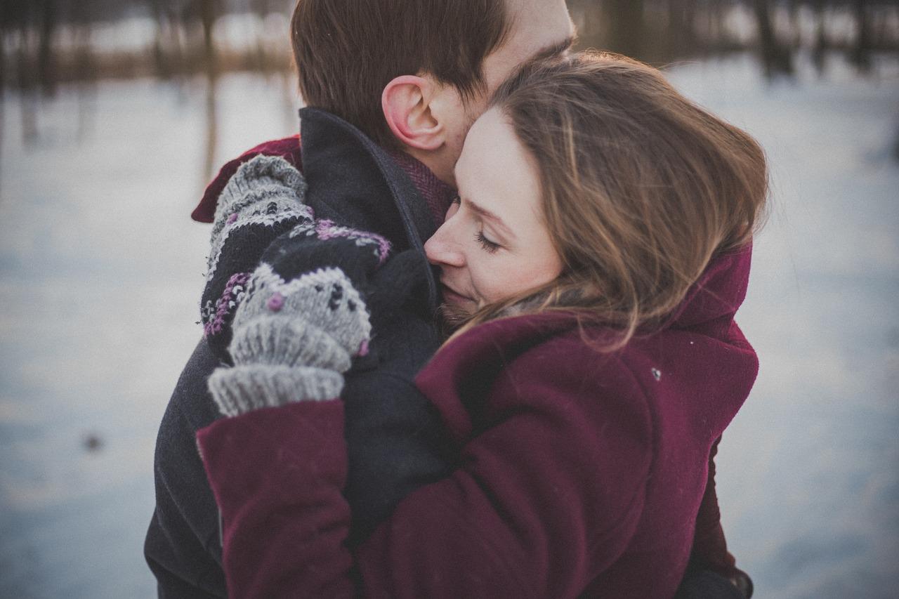 Couple in trendy coats.