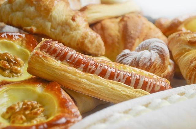 Photo of sausages in puff pastry dough