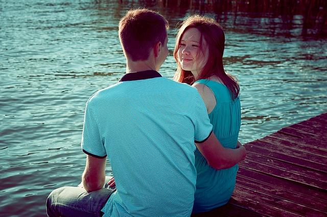 Guy with a girl on the pier