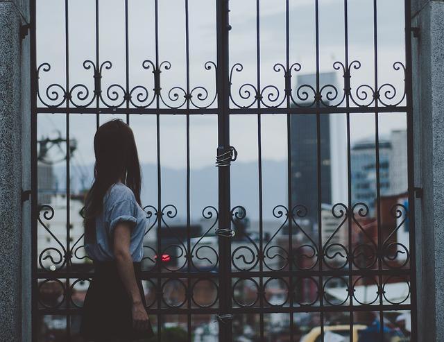 Girl looks at the city